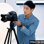 사진 자격증 취득 시 실기시험에서 꼭 필요한 장비 - A modern photography exam setting featuring a young Japanese photographer using a lightweight mirror...